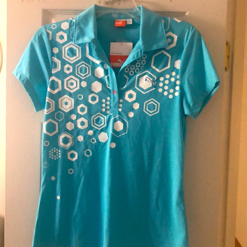 Puma, Ladies polo/golf shirt. New with tags.